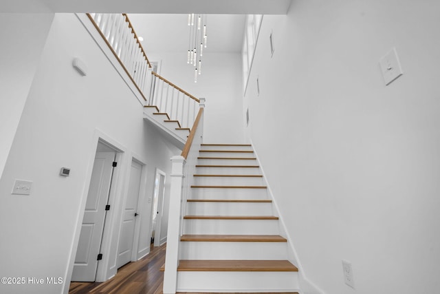 316 Bettie Path Rd, Beaufort, NC 28516 - staircase featuring a towering ceiling and wood finished floors