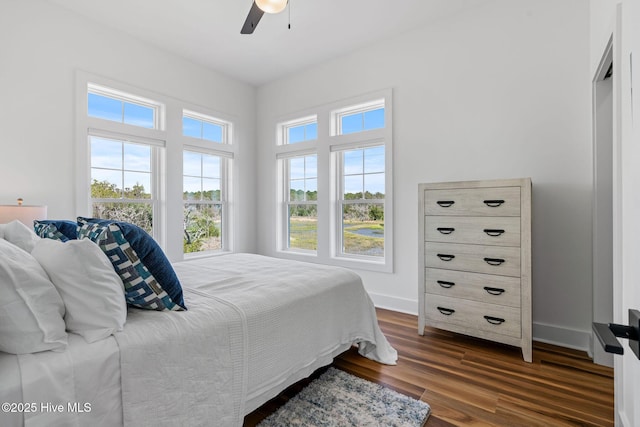 316 Bettie Path Rd, Beaufort, NC 28516 - bedroom featuring dark wood-style floors, baseboards, and ceiling fan