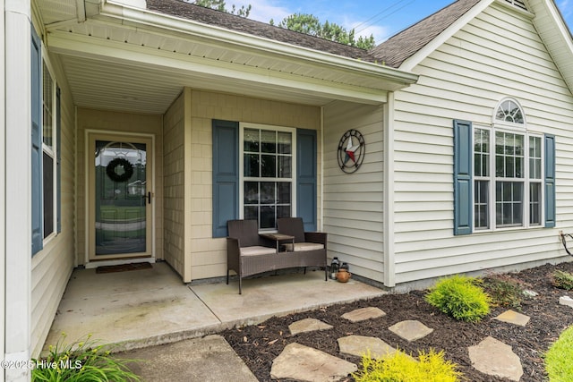302 Fairmount Way, New Bern, NC 28562 - doorway to property featuring covered porch and roof with shingles