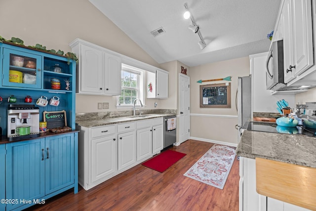 302 Fairmount Way, New Bern, NC 28562 - kitchen with stainless steel appliances, a textured ceiling, white cabinets, dark wood-style flooring, and rail lighting