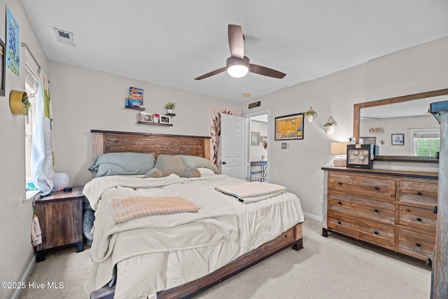 302 Fairmount Way, New Bern, NC 28562 - carpeted bedroom featuring a textured ceiling and ceiling fan