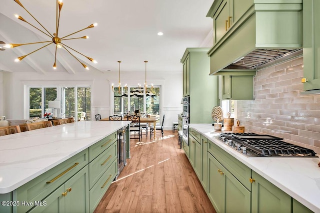3810 River Park Way NE, Leland, NC 28451 - kitchen with green cabinets, stainless steel gas stovetop, custom range hood, and recessed lighting