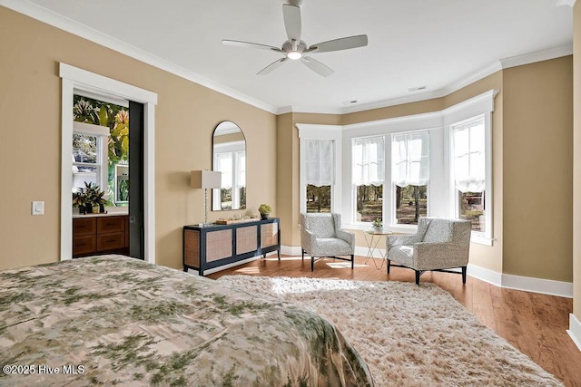 3810 River Park Way NE, Leland, NC 28451 - bedroom with crown molding, wood finished floors, and baseboards