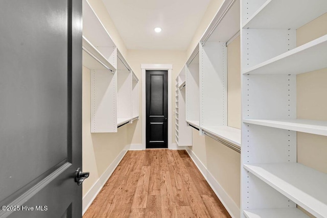 3810 River Park Way NE, Leland, NC 28451 - walk in closet featuring light wood finished floors
