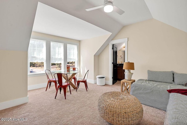 3810 River Park Way NE, Leland, NC 28451 - dining room featuring lofted ceiling, light colored carpet, ceiling fan, and baseboards