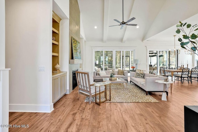 3810 River Park Way NE, Leland, NC 28451 - living room featuring ceiling fan, light wood-type flooring, a fireplace, baseboards, and recessed lighting