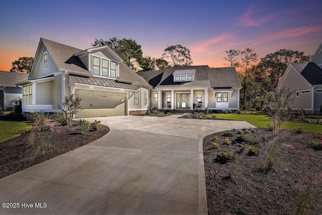 3810 River Park Way NE, Leland, NC 28451 - view of front of home featuring a porch, concrete driveway, an attached garage, and a front yard