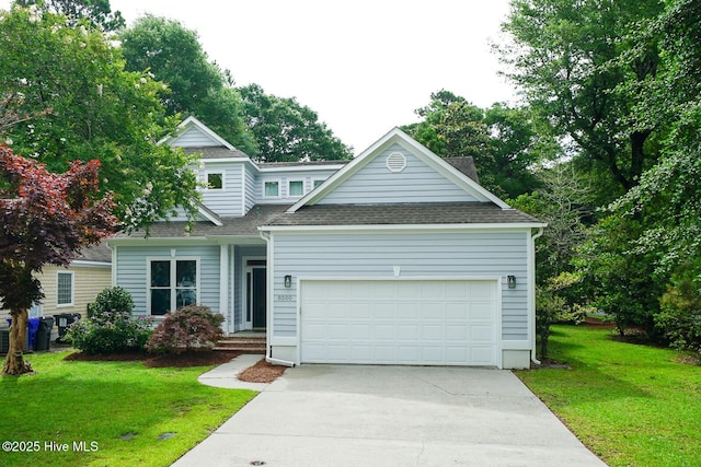 8500 Hammock Dunes Dr, Wilmington, NC 28411 - view of front facade with a shingled roof, a garage, concrete driveway, and a front yard