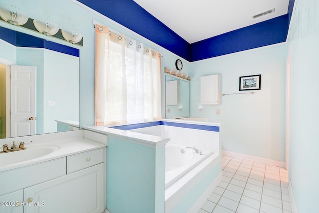 8500 Hammock Dunes Dr, Wilmington, NC 28411 - bathroom featuring a bath, vanity, tile patterned floors, and baseboards