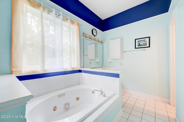 8500 Hammock Dunes Dr, Wilmington, NC 28411 - full bath with a whirlpool tub, vanity, tile patterned flooring, and baseboards