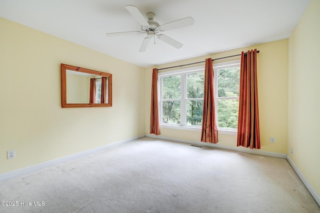 8500 Hammock Dunes Dr, Wilmington, NC 28411 - carpeted spare room with baseboards and a ceiling fan
