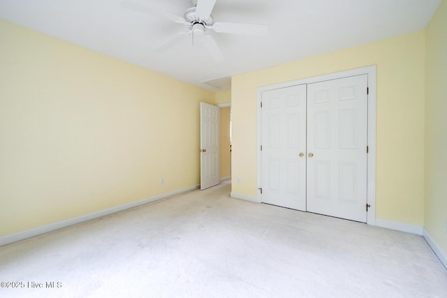 8500 Hammock Dunes Dr, Wilmington, NC 28411 - unfurnished bedroom with light carpet, baseboards, a closet, and a ceiling fan