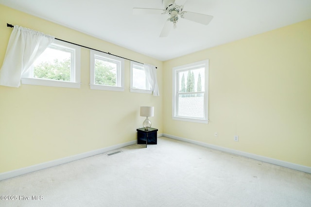 8500 Hammock Dunes Dr, Wilmington, NC 28411 - carpeted empty room featuring baseboards and ceiling fan