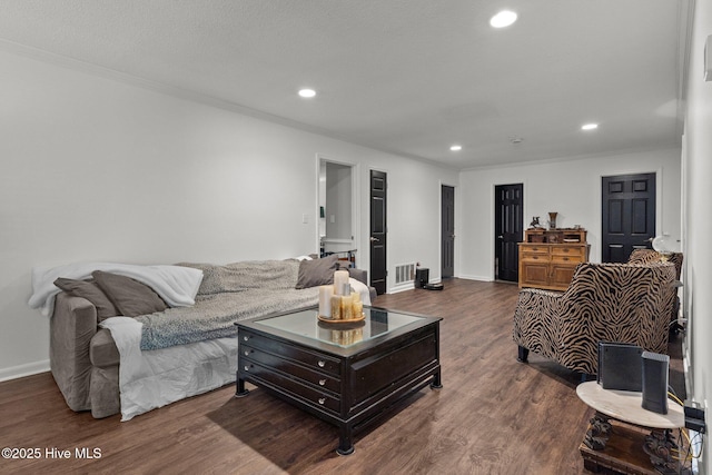 140 One Down St, Southern Pines, NC 28387 - living area with crown molding, recessed lighting, wood finished floors, and baseboards
