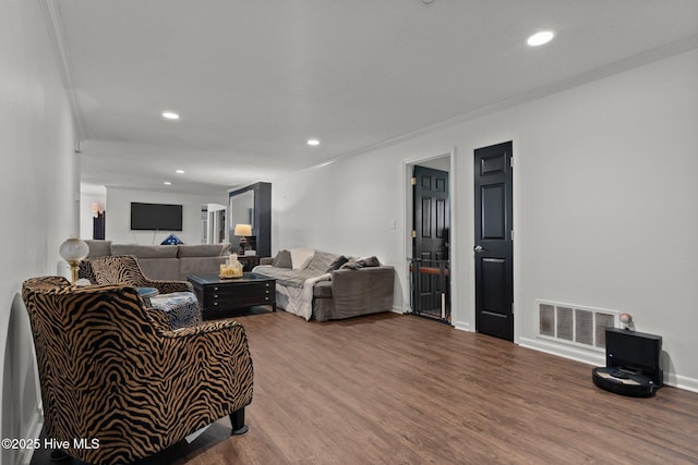140 One Down St, Southern Pines, NC 28387 - living room with crown molding, wood finished floors, recessed lighting, and baseboards