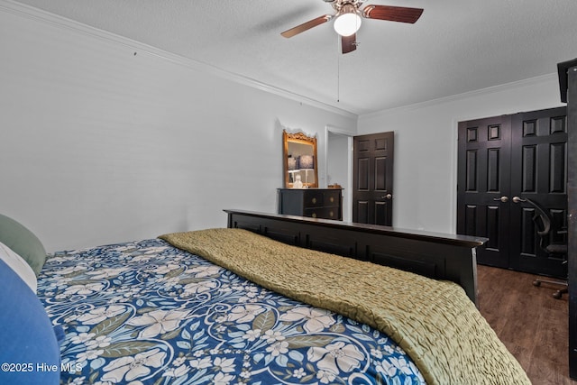 140 One Down St, Southern Pines, NC 28387 - bedroom with ornamental molding, dark wood finished floors, a textured ceiling, and ceiling fan