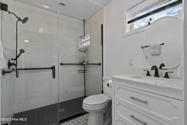 140 One Down St, Southern Pines, NC 28387 - bathroom featuring a stall shower, vanity, and toilet