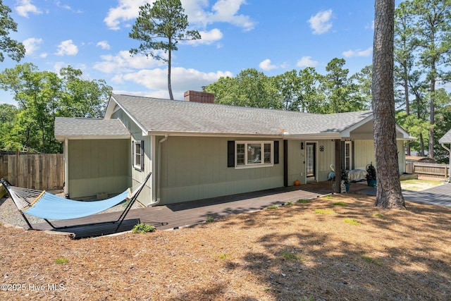140 One Down St, Southern Pines, NC 28387 - ranch-style home with a chimney and roof with shingles