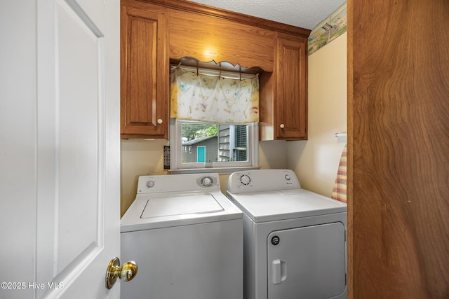 1137 Indigo Cir, Sunset Beach, NC 28468 - washroom with cabinet space, washing machine and clothes dryer, and a textured ceiling