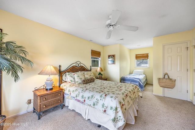 1137 Indigo Cir, Sunset Beach, NC 28468 - bedroom with carpet floors, ceiling fan, and baseboards