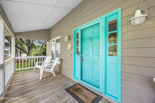 1137 Indigo Cir, Sunset Beach, NC 28468 - property entrance featuring a porch