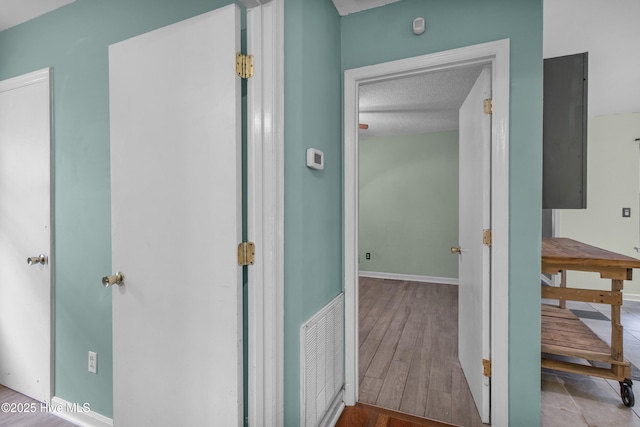 117 S 13th St, Wilmington, NC 28401 - hall featuring wood finished floors and baseboards