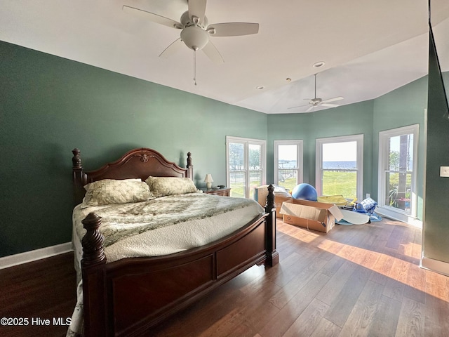 141 Baybreeze Dr, Shiloh, NC 27974 - bedroom with lofted ceiling, wood finished floors, baseboards, and a ceiling fan