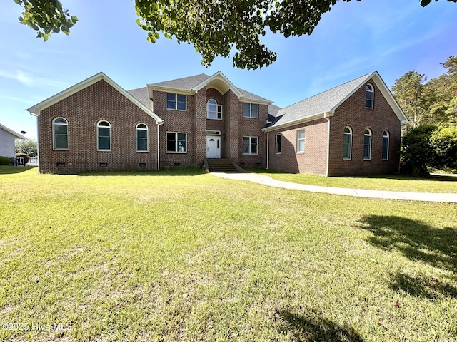 141 Baybreeze Dr, Shiloh, NC 27974 - view of front of home with crawl space, brick siding, and a front lawn