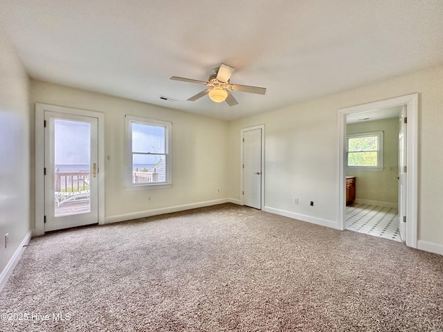 141 Baybreeze Dr, Shiloh, NC 27974 - empty room featuring carpet, ceiling fan, and baseboards