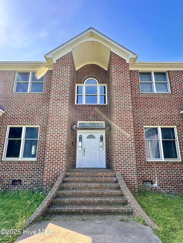 141 Baybreeze Dr, Shiloh, NC 27974 - view of front facade with brick siding and crawl space