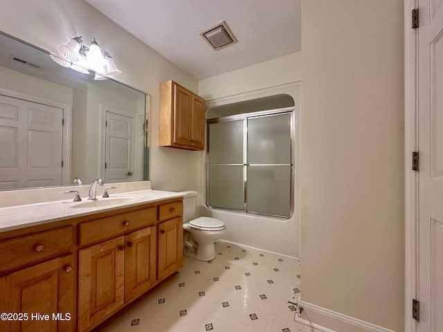 141 Baybreeze Dr, Shiloh, NC 27974 - bathroom with vanity, toilet, bath / shower combo with glass door, and tile patterned floors