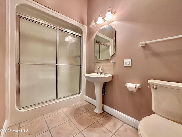 141 Baybreeze Dr, Shiloh, NC 27974 - full bathroom featuring tile patterned floors, toilet, a shower stall, and baseboards