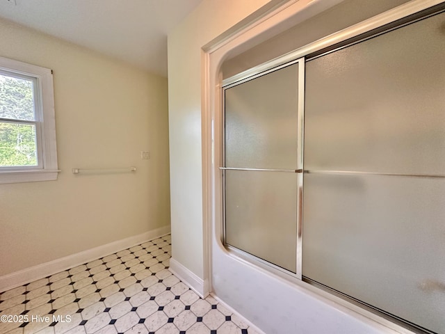 141 Baybreeze Dr, Shiloh, NC 27974 - full bathroom featuring tile patterned floors, enclosed tub / shower combo, and baseboards