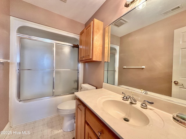 141 Baybreeze Dr, Shiloh, NC 27974 - bathroom with toilet, vanity, tile patterned floors, and enclosed tub / shower combo