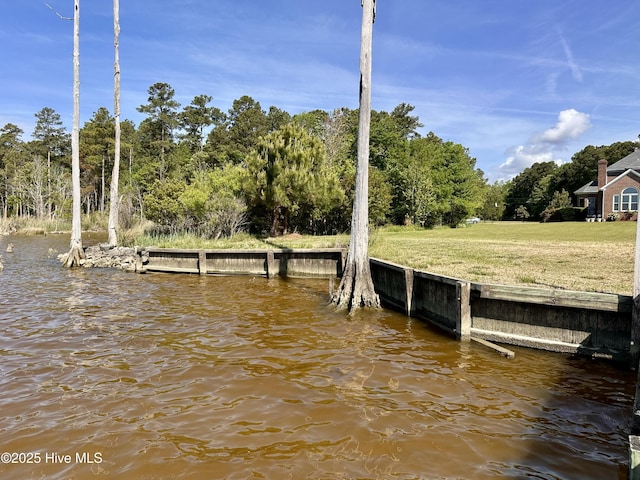 141 Baybreeze Dr, Shiloh, NC 27974 - dock area with a water view and a lawn