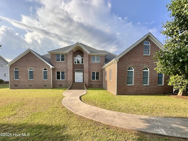 141 Baybreeze Dr, Shiloh, NC 27974 - view of front of home featuring brick siding, a front yard, and crawl space
