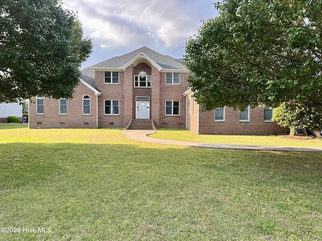 141 Baybreeze Dr, Shiloh, NC 27974 - colonial inspired home with crawl space, a front lawn, and brick siding