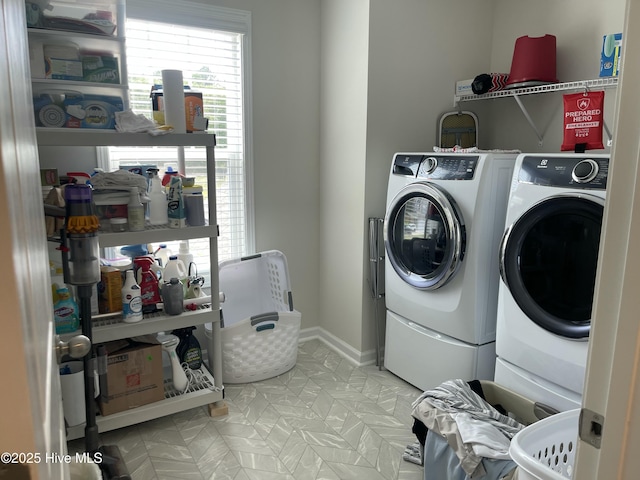 213 Woodsrun St, Raeford, NC 28376 - washroom with separate washer and dryer and plenty of natural light