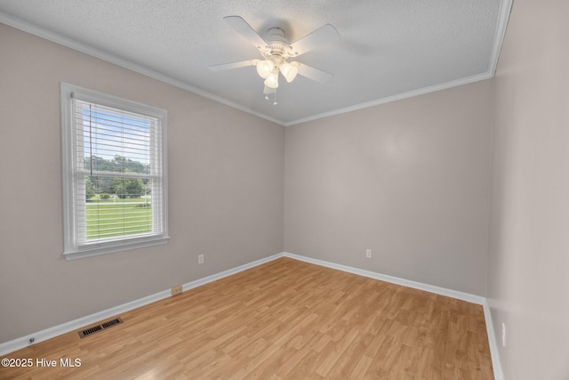 114 Maid Marian Ln, Washington, NC 27889 - empty room with light wood-style flooring, a ceiling fan, a textured ceiling, and ornamental molding