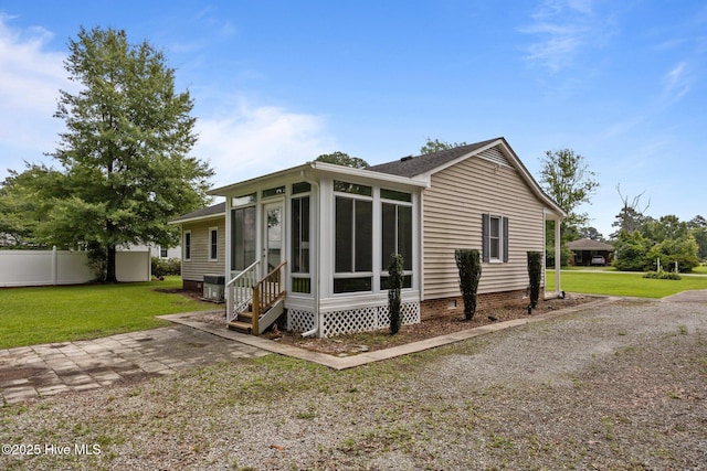 114 Maid Marian Ln, Washington, NC 27889 - rear view of house with entry steps, a sunroom, and crawl space