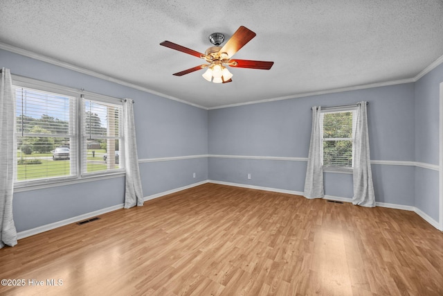 114 Maid Marian Ln, Washington, NC 27889 - spare room with light wood-type flooring, a textured ceiling, ceiling fan, and ornamental molding