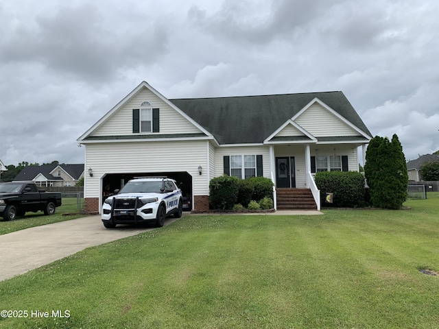 203 Maddux Dr, Pikeville, NC 27863 - traditional-style home featuring driveway, a garage, and a shingled roof