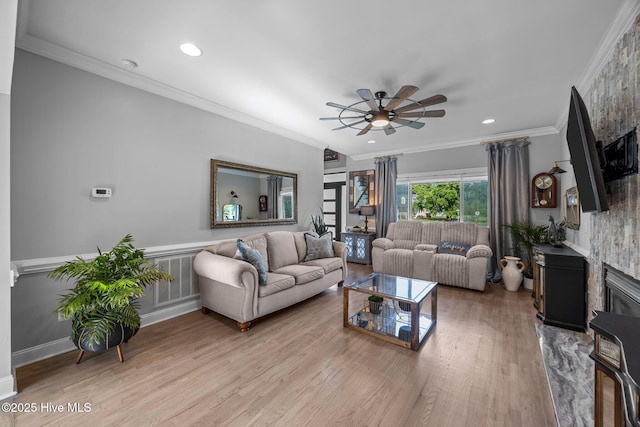 2221 Greaves Ct, Winterville, NC 28590 - living area with a ceiling fan, light wood-style floors, a fireplace, recessed lighting, and crown molding