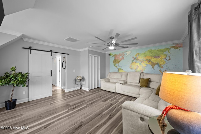 2221 Greaves Ct, Winterville, NC 28590 - living room with a barn door, a ceiling fan, wood finished floors, and crown molding