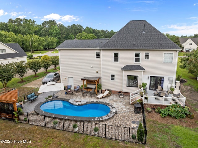 2221 Greaves Ct, Winterville, NC 28590 - view of pool with outdoor dining area, a patio, a wooden deck, and an outdoor hangout area