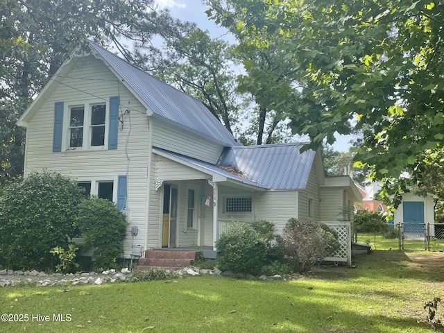 958 Holly Rd, Lakeview, NC 28350 - view of front of home with a metal roof