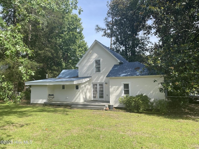 958 Holly Rd, Lakeview, NC 28350 - back of property featuring a yard, a wooden deck, and french doors