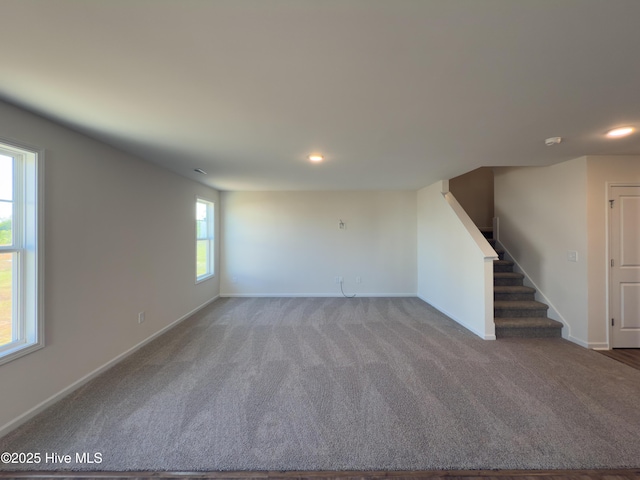 2215 Roadster Pony Ln, Hope Mills, NC 28348 - unfurnished living room with stairway, recessed lighting, carpet flooring, and baseboards
