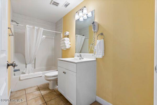 1505 N New River Dr Unit 210, Surf City, NC 28445 - full bath with toilet, vanity, shower / bathtub combination with curtain, and tile patterned flooring
