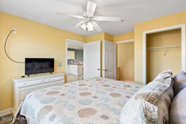 1505 N New River Dr Unit 210, Surf City, NC 28445 - bedroom featuring a closet, baseboards, and ceiling fan